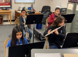 Students playing band instruments